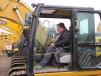 Mike Miesiac of Site-Pro Contracting runs this Cat 312D excavator before the sale.  
 