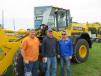 (L-R): Matt Stuhmer, Jason Carpenter and Brian Vogt, all of Petersburg Plumbing and Excavating, stand in front of Komatsu WA 270 wheel loader. 
