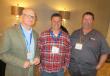 (L-R): Mike Slinger, Murphy Tractor & Equipment Company, talks with Chuck Cook and Mike Poorman, both of Bulk Equipment Company, at the event. 
 