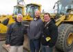 (L-R): Ken Grosheart, Chris Banta and Lohn Liter, all of Liter’s Inc., hope to take home a wheel loader while selling off some of their excess equipment. 
 