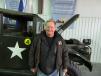 Butch Stambaugh of Stambaugh & Sons enters the winning bid on this 1951 Dodge military power wagon.
 