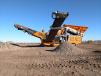 Portafill 5000 tracked screen makes clean drain rock from natural sand and gravel.
 
