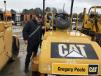 Antonio Rincon of Global Equipment in Charlotte, N.C., inspects this Cat CB224E compactor. 