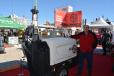 Dmitri Cremo, northeast regional sales manager, stands along side Chicago Pneumatic’s V4W light tower.
 