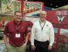 Joe Cook (L) and Brian Callaway, both of Pro-Tec Equipment, stand ready to answer guests questions.
