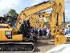Crowds gather at excavator row during the Alex Lyon & Son sale.

