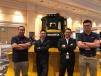 Representatives of Shantui America Corp proudly introduced their product line at the AED Summit. Standing in front of their DH10J dozer (L-R) are Roger Xie; Jimmy Cheng, president; Frank Hu and Max Wang. 