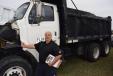 Harry Mulder of Rush Truck Centers, Tampa, Fla., was very happy with his findings after he inspected the engine of this Sterling dump truck.
