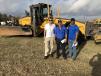 (L-R) are Adam Gibbings of Red Bull Equipment in Denton, Texas; and Vicente and Javier Martinez of J&D Equipment in Miami, Fla. Vicente has been attending the Kissimmee auctions for 38 years.
