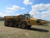 A highlight of the Yoder & Frey auction was a large selection of late model Caterpillar articulated trucks
 