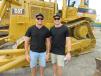 Michael and Scott Worthington of Worthy Parts, who were in contention to win the award for traveling the farthest distance to attend the Ritchie Bros. auction in Kissimmee, considered machines to take back to Australia for work in mining operations.

