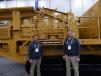 Scott Timmer (L), regional sales manager, and Matt Brinkman, director of engineering, both of Screen Machine, Etna, Ohio, stand with the new 4043TR impactor. The 4043TR closed-circuit impact crusher features a large two-deck screen, fed directly from the crusher, and delivers sized product off the fines conveyor, and an additional radial conveyor feeds directly back into the hopper, or can be positioned to the side for stockpiling.
