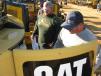 Opening up a Cat 305c mini-excavator are Timothy  Lemmons (L) and his brother, Jimmy, both of Lemmons Landscaping and Clearing, Jasper, Ala.
 
