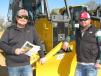 Brad (L) and Bo Gaines, both of Gaines Equipment Company, Heflin, Ala., look over some of the dozers about to go on the black.
 
