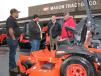 (L-R): Abel Barrita and Edgar Gonzales, both of Aztec Landscape Services, Norcross, Ga.; Hank Thacker of Kubota; and Marty Cape of Mason Tractor, demo a sale-priced Kubota Z726X zero turn turf machine. 
