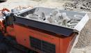 A Rockster R1000 impact crusher recycles porcelain toilets.