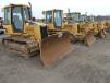 Several Caterpillar D5 crawler tractors were auctioned off; prices ranged from $20,000 to $35,000.