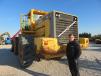 Ethan Lester of Lester’s Material Service Inc. looks over this Volvo L330D wheel loader. 
