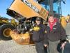 Gary Peiffer (L) and Dave Reed, both of Gary’s Auto, take a look at the engine of this Case 621 wheel loader. 
