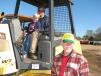 It was a family affair for machine inspections as (L-R) five-year old Cole Rees, his dad, Josh Rees, and grandfather, Fred Rees, needed to buy a used dozer for their farm in Clinton, Miss.
