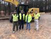 Bill Dolbier (R), Gregory Poole Equipment Company, goes over the features and benefits of the Cat 320 next generation excavator with (L-R) Jake London, Nate McKee and Andy Couturier, all of Horne Brothers in Fayetteville, N.C.
