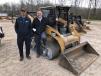 Looking over the selection of compact track loaders are Todd Jackson (L) of South Carolina Equipment Company in Seneca, S.C., and David Ion of Lumber Connection in Walhalla, S.C.
