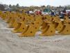 Hundreds of excavating buckets of all sizes were available for bidding.