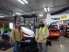 Shane Amundson (L), foreman, and Alex Amundson, equipment operator, both of Concrete Pressure Lifting, are considering adding an excavator to their fleet, like this Bobcat E32 mini-excavator. Currently, they run three Bobcats in their fleet.
 
