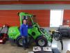 Sales Representative Brian Bjonfald stands with the Avant 760i loader, a new model and the biggest loader from Avant. The loader is a multi-purpose machine that can be used by parks departments, municipalities and landscapers of all sizes.
 