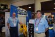 Eugene Lant (L), vice president, and Marty Oscarson, both of Holland Pumps, Orlando, Fla., stand in front of this Selwood pump at the APWA Expo. 
