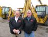 Brothers Roger (L) and Keith Thornsbury of R & L Paving Inc. are on hand looking for bargains.
