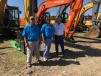 (L-R): Bo Mitchell of Hampton Farms in Beaufort, S.C., and Ryan and Bill Dennis of Lake Moultrie Construction, Bamberg, S.C., discuss excavators. 

