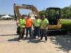 (L-R): Brandon Trent, Jakob Puskas, Chris Ramsey and David Marlowe, all of Thomson, Corder & Co Civil Contractors in Wilmington, N.C., take a look at this Cat 305E2 mini-excavator. 
