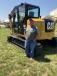 Bobby Howell of Howell Grading in Midland, N.C., shows some interest in this Cat 308E2 mini-excavator.
