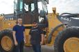 Carlos Molina (L) and Mario Chavez of RM Excavating in Denver were adding a wheel loader to their fleet and plan to bid on this John Deere 544J. 
 