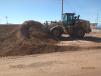 Fisher Sand & Gravel using a Cat 996M wheel loader to load borrow material for new lane construction.
 