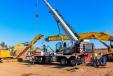 A Link-Belt HTC-86110 110-ton (100-t) hydraulic truck crane lifts an excavator boom for Great Lakes Environmental Structure near Greeley, Colo. 