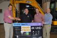 Bill Dorazio (second from L) of Colt Refining & Recycling, Merrimack, N.H., was the grand prize winner at the event. With him and his new Sharp 4K TV are Branch Manager Jeff Hawkins (L); Bill Spain (second from R), sales representative; and Kevin Blacker (R), service manager. 