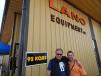 Sports radio morning show personality from Twin Cities radio station KQRS Bob Sansevere (L) stands with Lano Equipment Shakopee sales manager Juston Lano. 
 