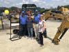 (L-R): Brian Scott, Janis Hargett, Joe Reynolds and Sharon Pigford, all of Uwharrie Environmental, a division of Republic Services, check out some of the equipment. 