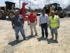 (L-R): Samuel Martinez, Daniel McGuirt, Jesus Garcia and Reymol Cortez, all of J.T. Russell & Sons in Albermarle, N.C., discuss the equipment available at the event. 