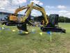 Guests needed to use the Yanmar excavator bucket and thumb to grab the block during the skills competition.  