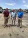 (L-R): Jonathan Loyless of Bank of the West Equipment Finance; Rob Lynch, president of Rob’s Hydraulics; and Mark Riley of Wells Fargo discuss the available equipment. 