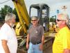 (L-R): Jack Gosnell and Mike Thompson, both of Thompson’s Garage in Fountain Inn, S.C., have a few laughs with Anthony Terrell of SPC Inc. in Simpsonville, S.C., before the auction begins. 