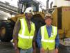 Meeting to discuss machine performance are Willie Keen (L) of International Paper and Noland Thacker of Yancey Bros. Co. 