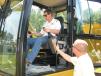 Will Hutchins (L) of Lineberger Construction in Lancaster, S.C., gets some operational pointers for the new generation excavators from Blanchard Machinery’s Brian Hutchison. 