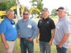 (L-R): Jay McCormack of Blanchard Machinery and Dave Arney, Paul King and Morris Livingston of King Construction Services Inc. in Myrtle Beach, S.C., talk about the new generation of hydraulic excavators being demonstrated at the event.
 