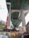 Crews at work on the underside of the Tobin Bridge in May. 