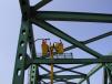 Electricians work on Tobin Bridge rehabilitation project. 
