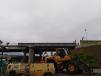 The work will see the current I-77 bridge (one southbound and one northbound 420-ft.-long structures, two lanes in each direction) demolished and replaced with a 510-ft.-long bridge that has three lanes in each direction.